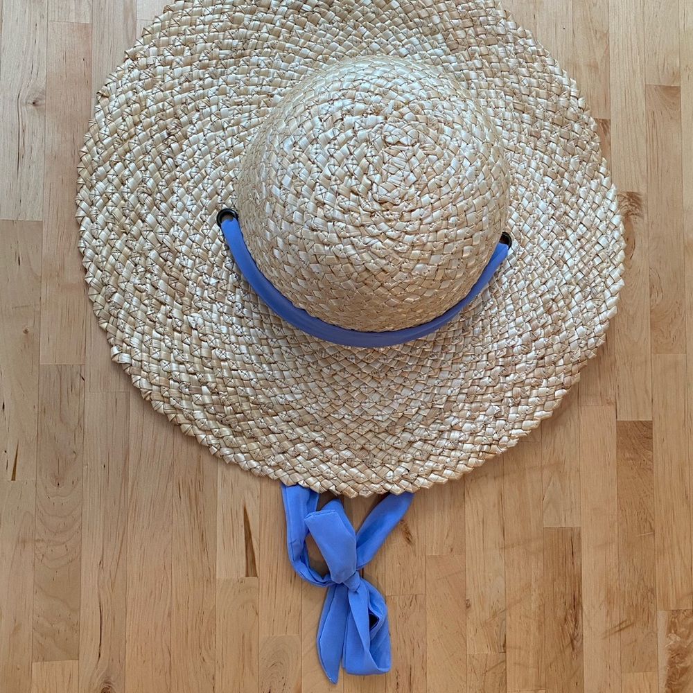 Straw boater hat with cornflower blue ribbon